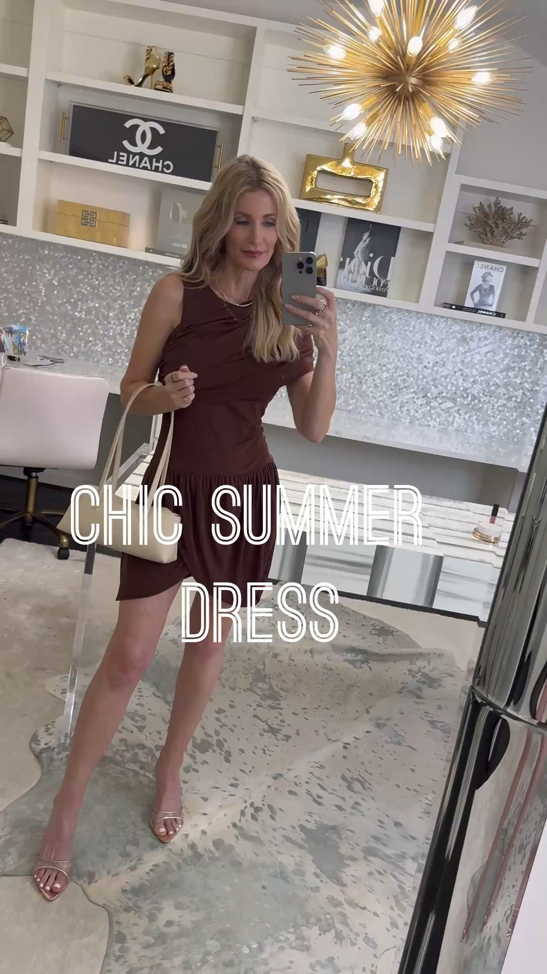 The chicest little summer dress just arrived 🤎 This chocolate brown bubble hem dress is lightweight, fully lined, wrinkle-free, and so easy to style for date night, vacation, dinner, or summer events. The draped neckline makes it feel elevated without trying too hard. Wearing XS. #LTKStyleTip #LTKOver40 #LTKWedding 

 