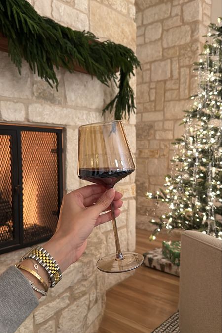 Soaking up the last few remaining holiday moments, and of course poured myself a glass of red in my new wine glasses! 

Also, my Christmas tree is the lowest price I have seen it this season! 

#LTKsalealert #LTKfindsunder100 #LTKhome