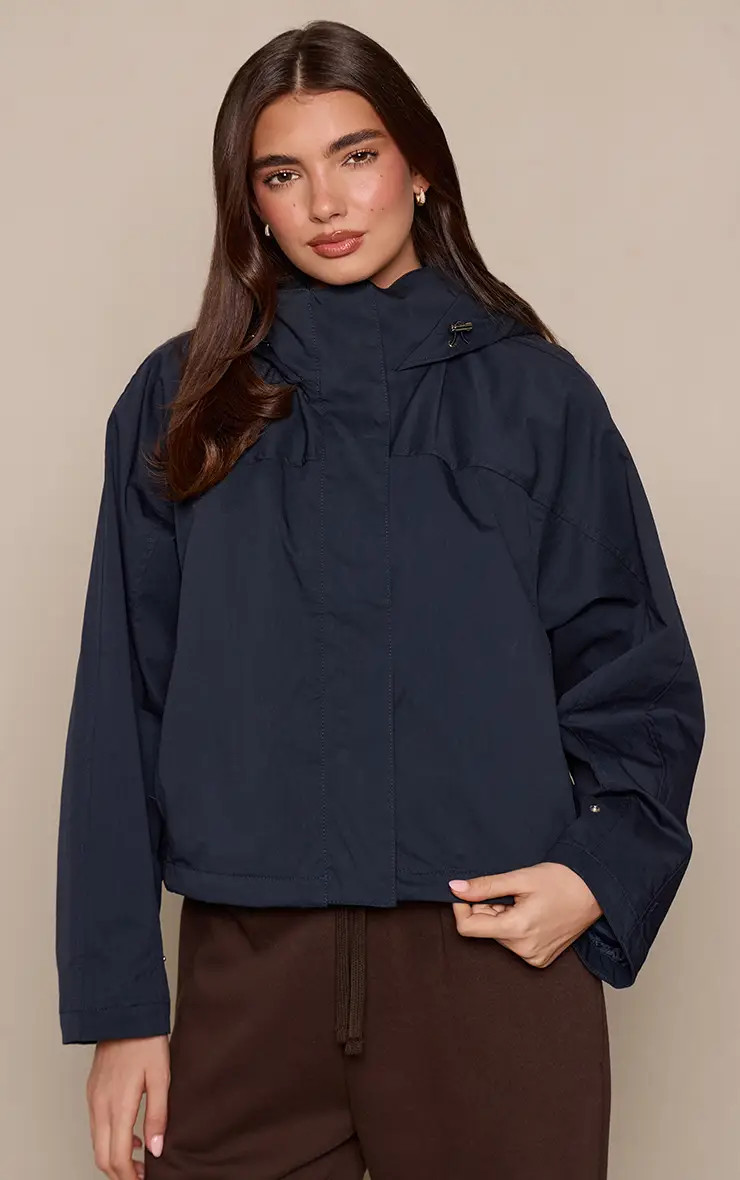Navy Funnel Neck Ruched Windbreaker | PrettyLittleThing US