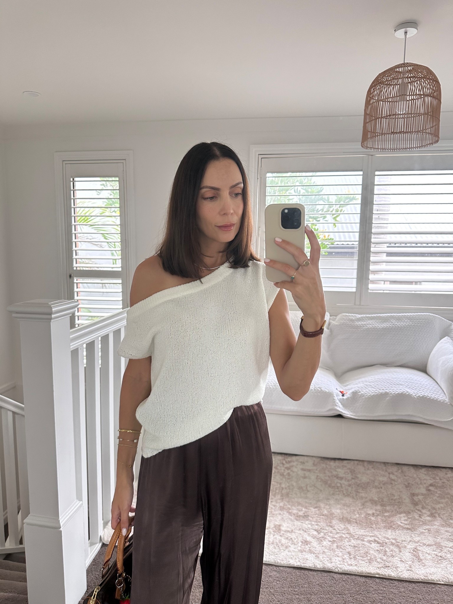 Cream off shoulder knit top and chocolate brown silk pants 

#LTKsummer #LTKaustralia #LTKspring