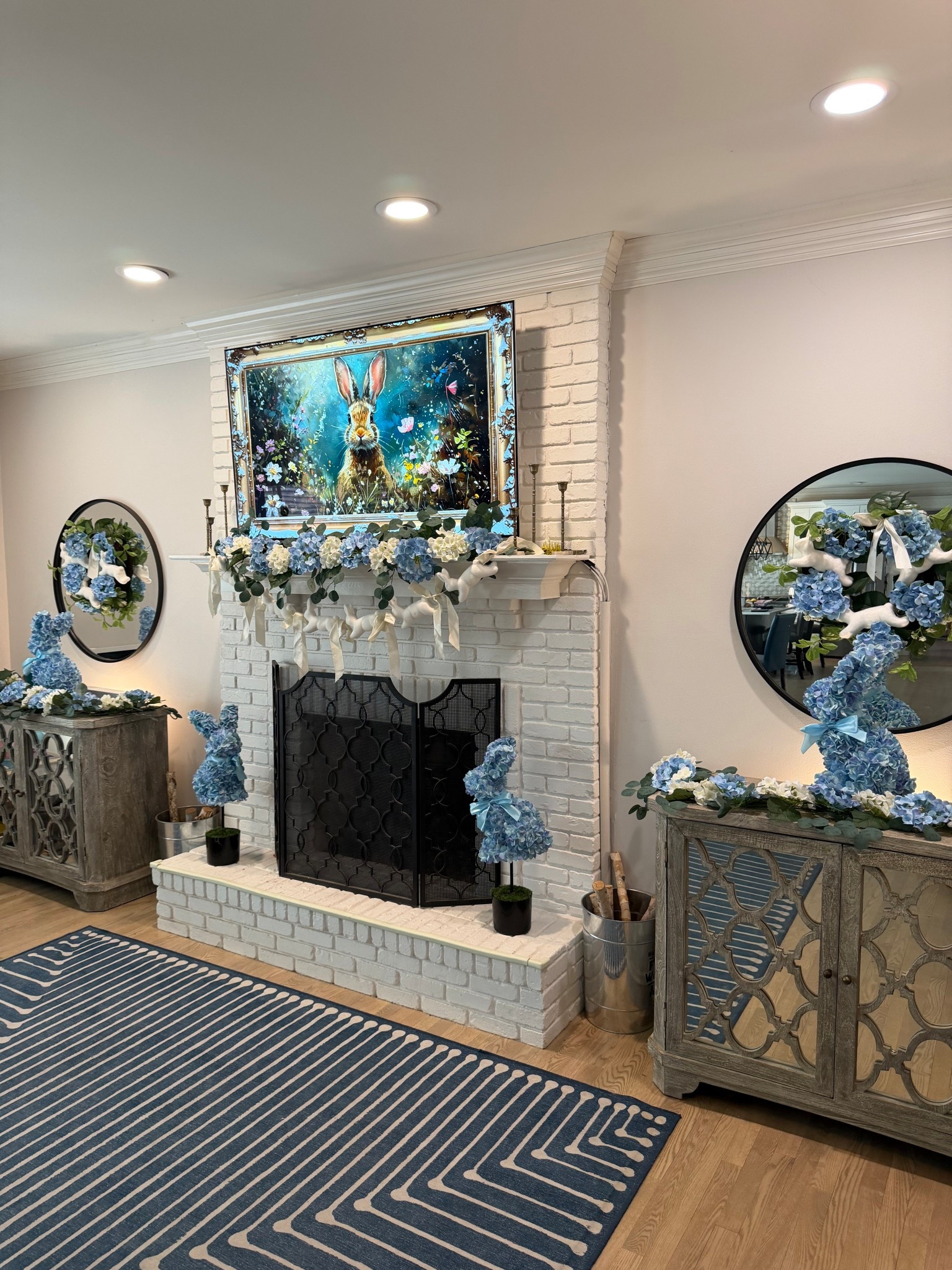 Ran to the store for a few spring touches and somehow my whole fireplace turned into a storybook moment 🐰💙 the hydrangea garland, bunny accents, and soft blue details are giving fresh, cozy, and ready for Easter.

It feels elevated but still so playful.

#springdecor #walmartfinds #easterdecor #fireplacedecor #seasonalstyling #blueandwhite #homedecorfinds

#LTKhome #LTKfindsunder50 

#LTKSeasonal