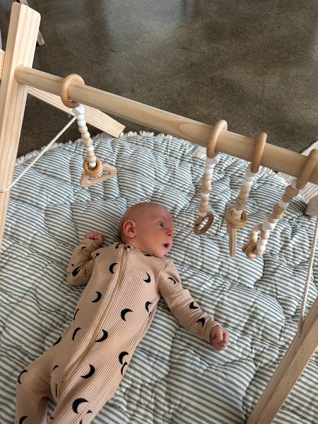 Our neutral baby gym, double sided play mat and cutest thermal onesie! 

#LTKhome #LTKbaby #LTKfamily
