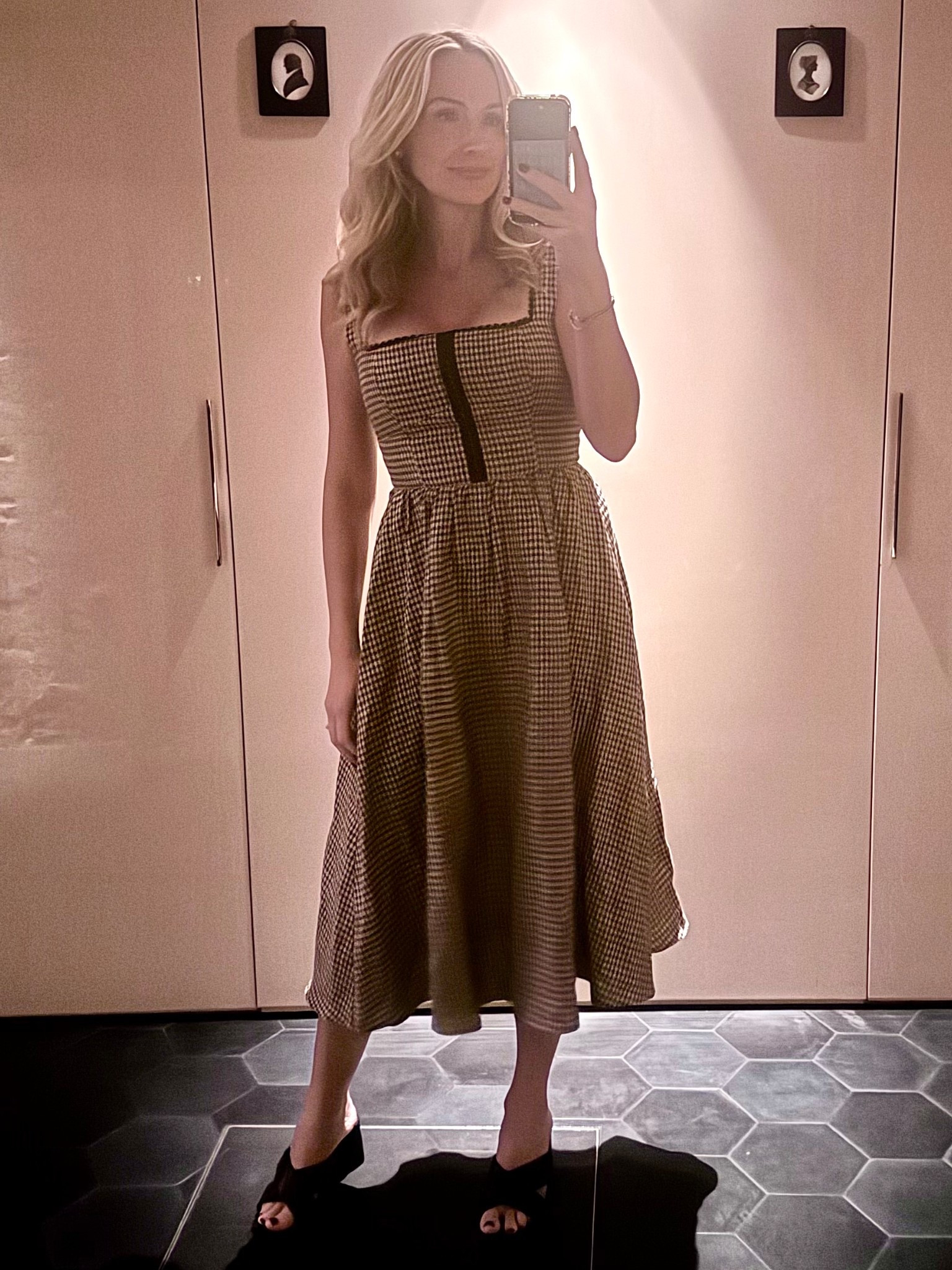 Neutral gingham for the win 🤍 This classic midi dress is easy, comfortable, and chic for any occasion. Pair it with a blazer or chunky cardigan for fall  

gingham midi dress, neutral outfit ideas, capsule wardrobe outfit, chic summer dress, brunch outfit inspo, classic feminine style

#LTKOver40 #LTKStyleTip #LTKTravel