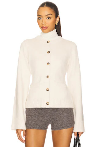 Good American Button Front Knit Cardigan in Vanilla001 from Revolve.com | Revolve Clothing (Global)