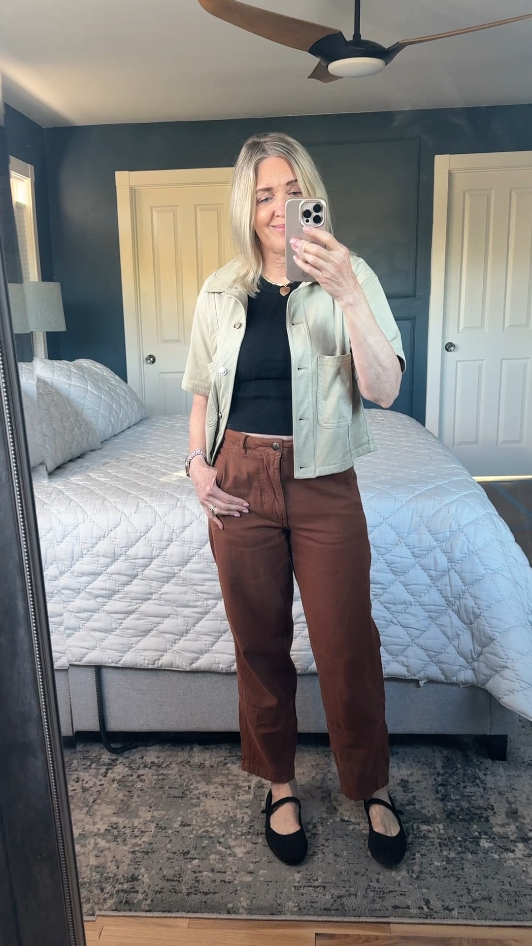 Instead of a denim jacket, try a faux suede jacket for your topper. This one from Evereve is a great wardrobe staple and fall transition piece. Wearing size small. @Quince barrel jeans in rust size 0. Fall outfits for women over 50. Date night outfits. Business casual outfit. Fall outfit ideas over 50.