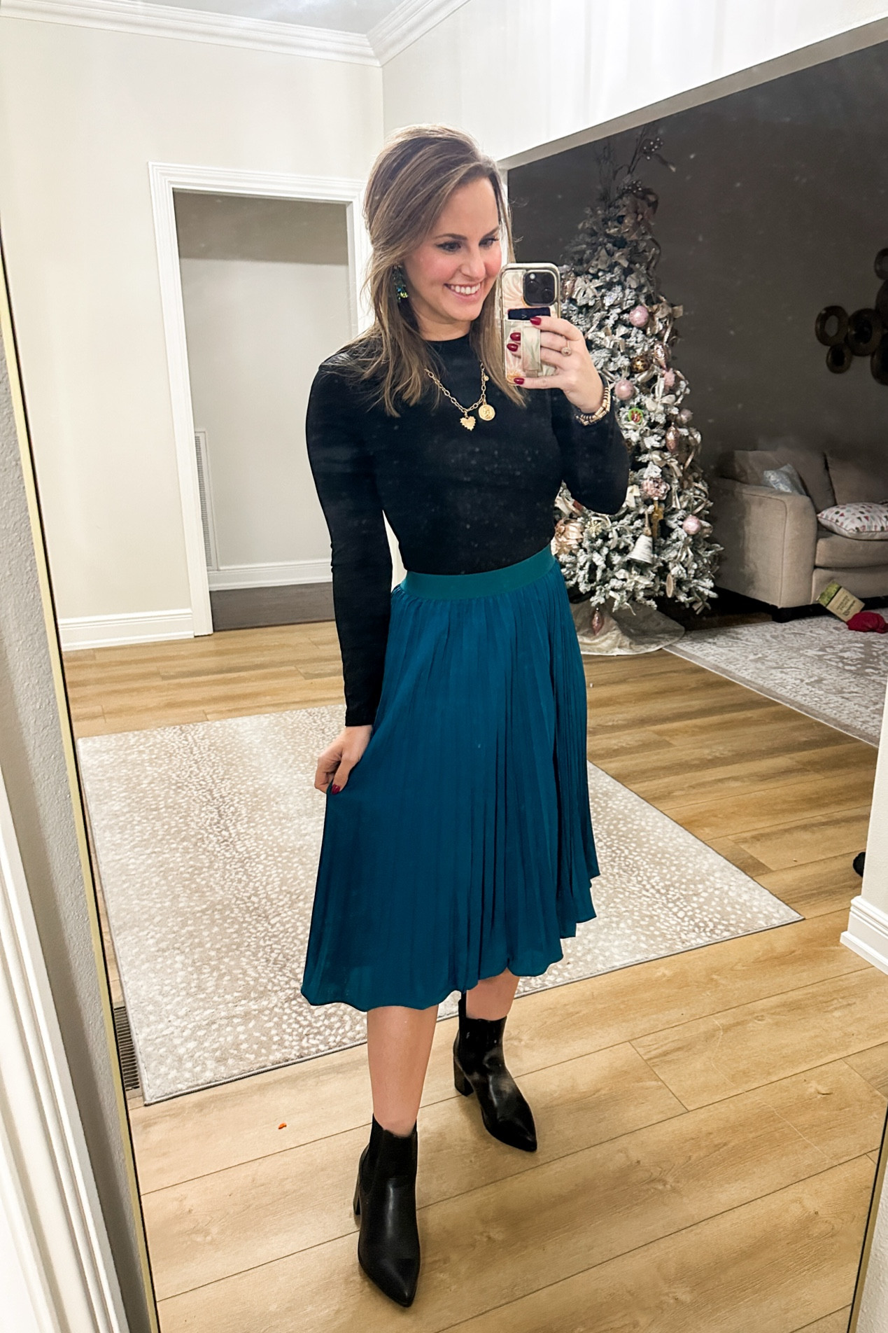 Christmas dinner outfit! 

Holiday party outfit inspo from Amazon! Wearing size M in this skimms look alike too and pleated skirt. Black heeled ankle booties & gold coin & heart charm necklace. 

#LTKWorkwear #LTKHoliday #LTKFindsUnder50
