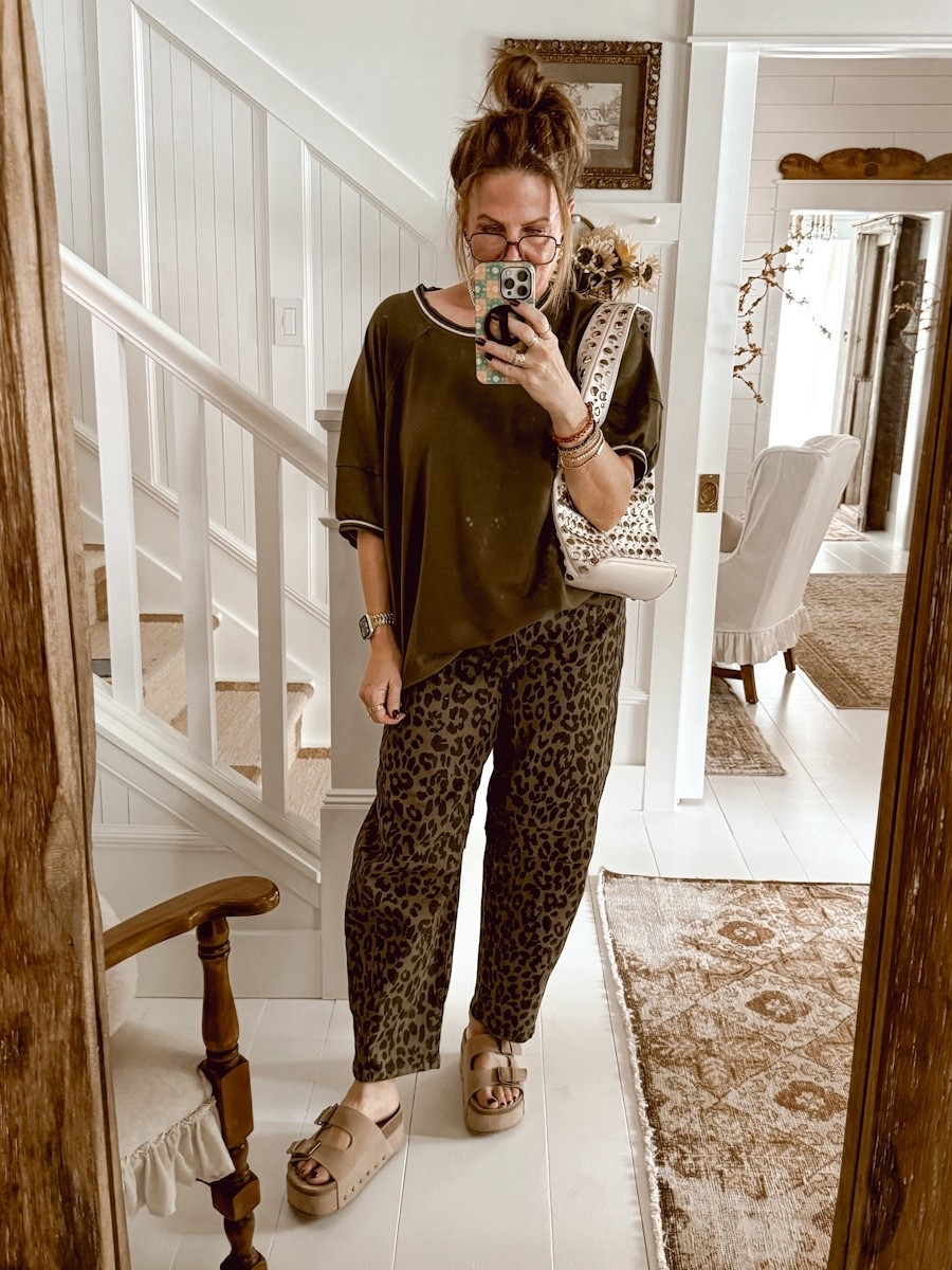 Outfit of the Day: my OOTD is inspired by my new mid-ride barrel jeans. I got a fun leopard print for an edgy look that goes outside a lot of my general everyday pieces. I paired it with this oversized Dokotoo top and some platform sandals. 

#LTKFindsUnder50 #LTKMidsize #LTKSeasonal