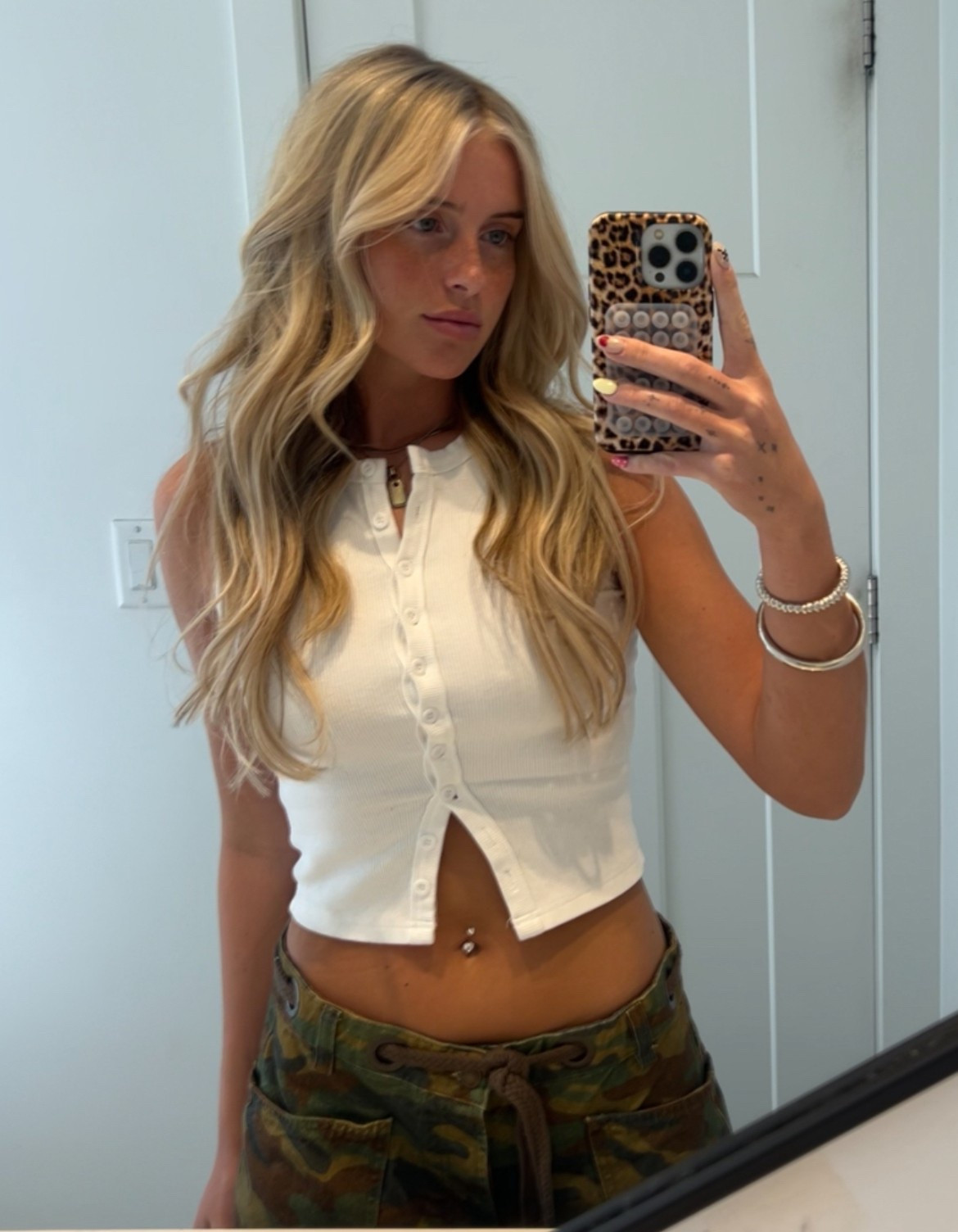 crisp white, cool camo 🤍✨
silver details + laid-back outfit for that effortless look #ltkstyle #cleanlook #coolgirlenergy