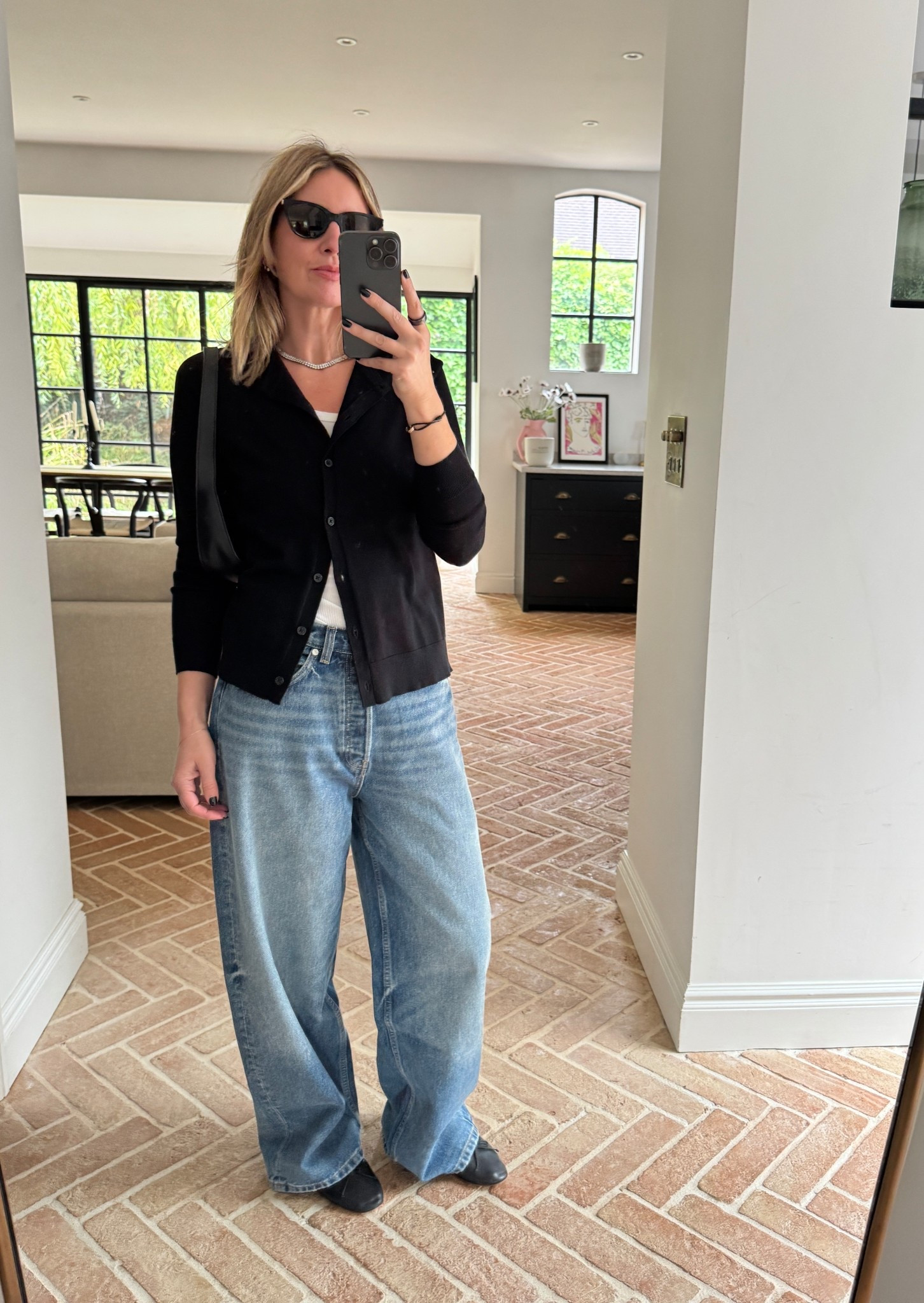 Baggy jeans + black cardigan | Zoë Kravitz inspired outfit from New York | New York Style | ballet flats | autumn outfit 

#LTKeurope #LTKautumn #LTKstyletip