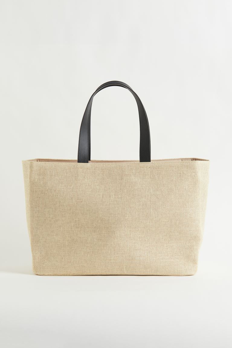Beach bag in braided paper straw. Faux leather handles, magnetic fastener at top, and a small inn... | H&M (US + CA)