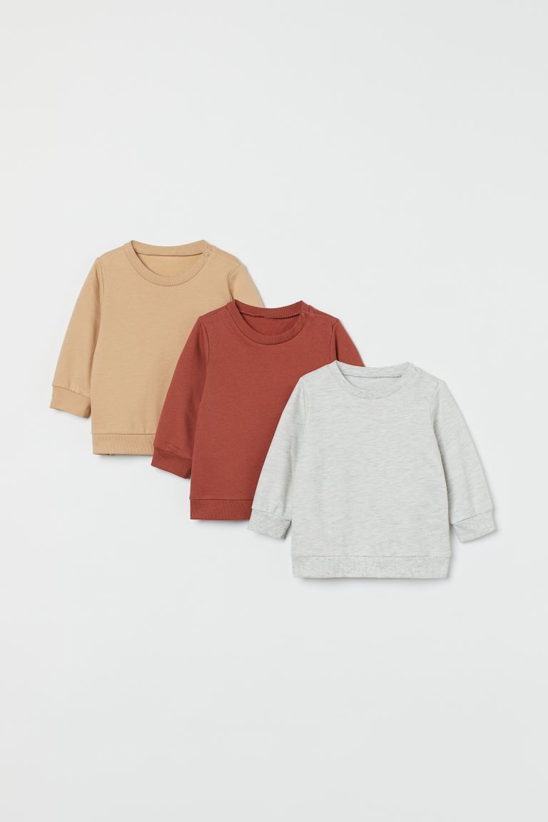 Long-sleeved sweatshirts in organic cotton fabric. Round neckline, snap fastener on one shoulder ... | H&M (US)