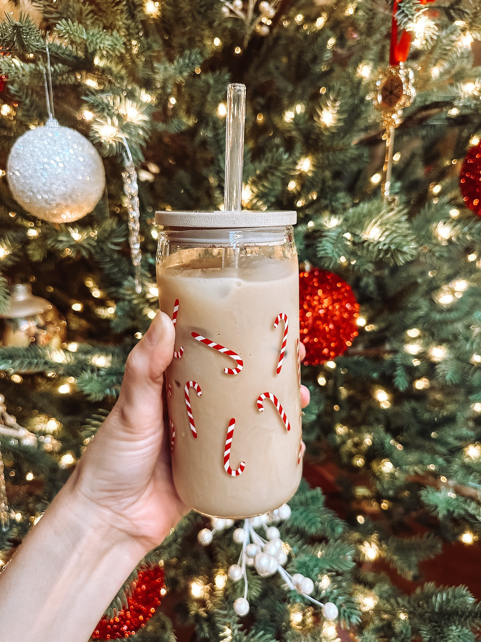 The simple joy of enjoying coffee in a Christmas glass! 🫶🏻🎀🎄

#LTKSeasonal #LTKHome #LTKHoliday