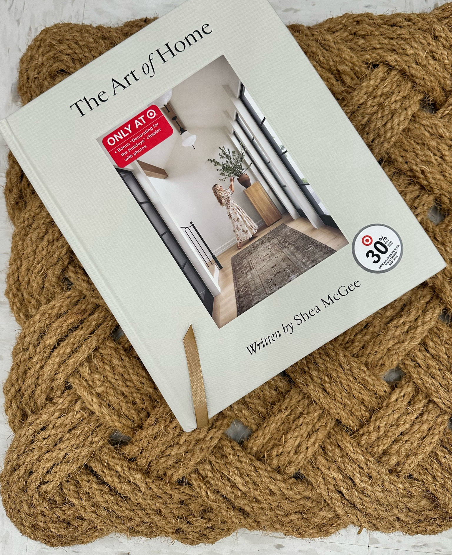 $20 doormat and book discounted if bought at target