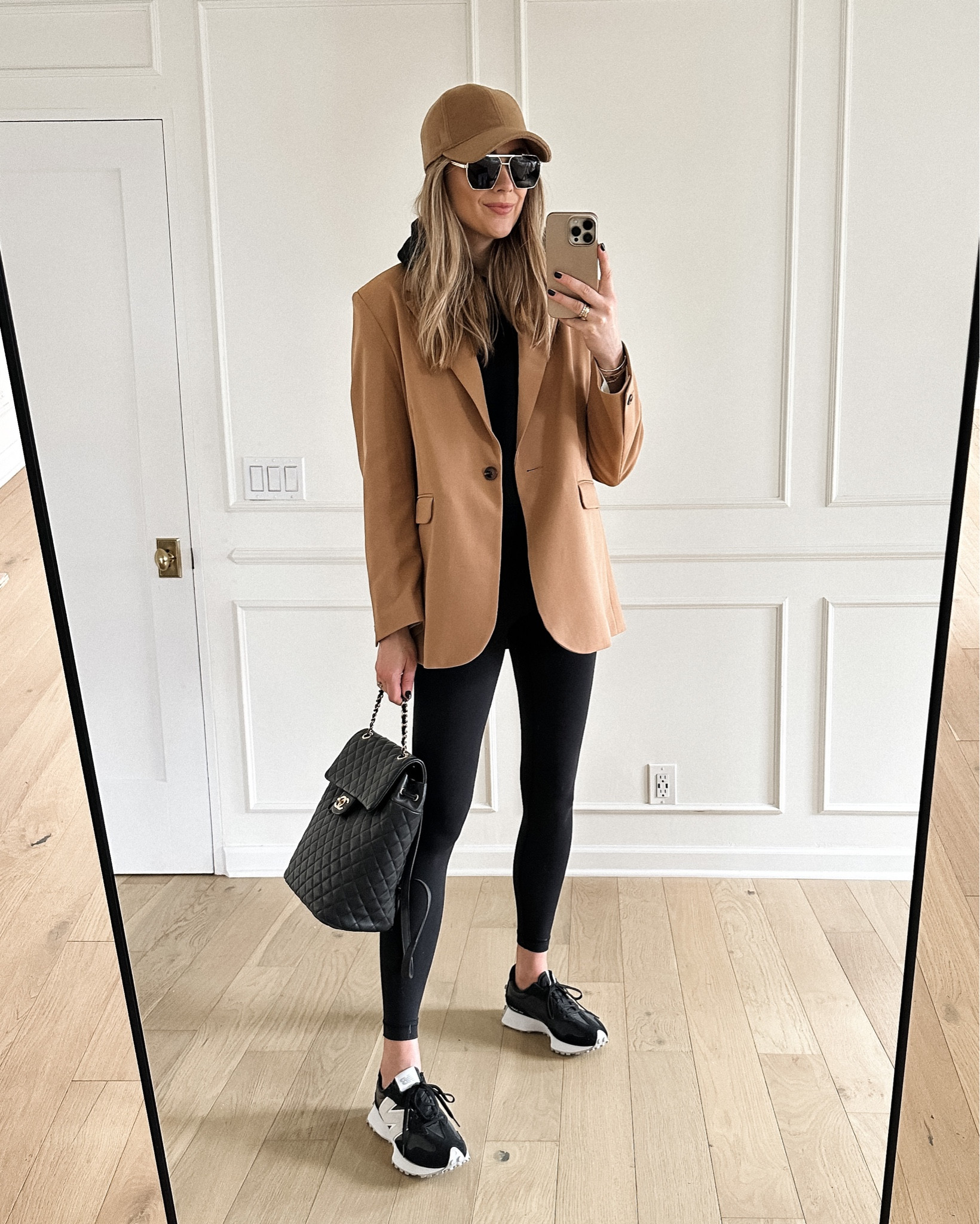 Fashion Jackson wearing camel blazer (small), black leggings, new balance sneakers, baseball hat #fashionjackson #athleisure #sneakers 

#LTKstyletip #LTKshoecrush #LTKunder100