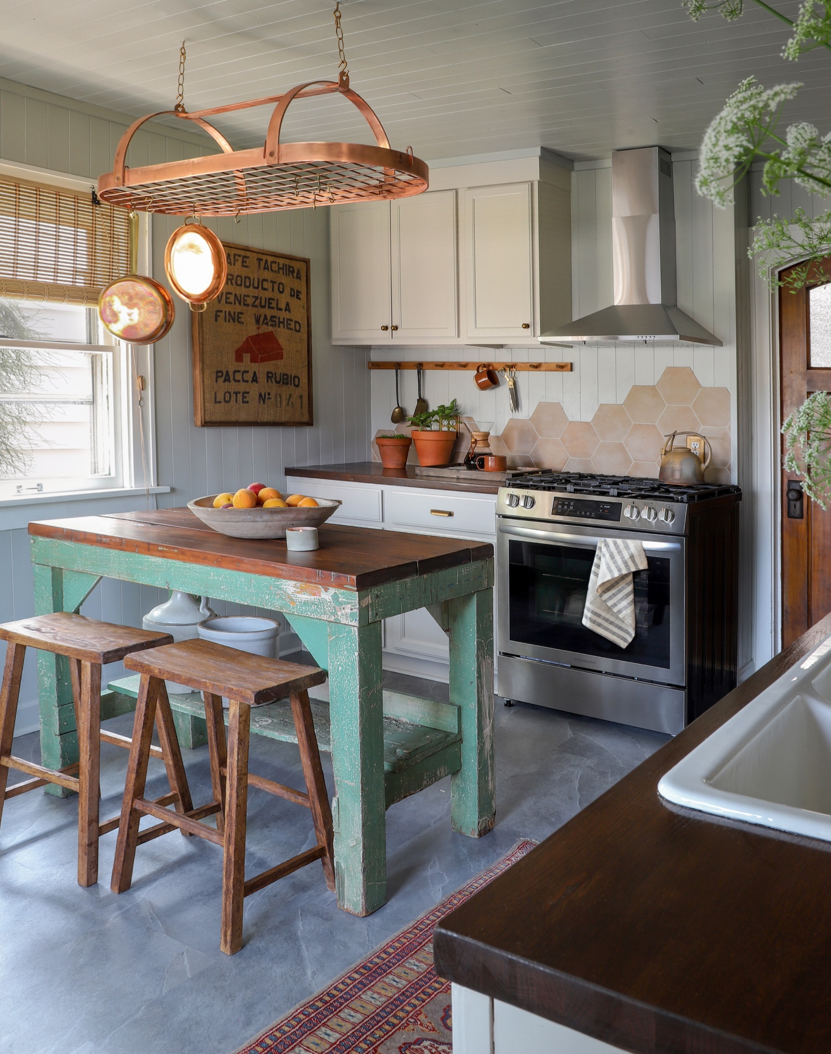 This is a 3-Day Venezuelan-inspired kitchen renovation with hexagon tile backsplash for my show “Makeover by Monday”!