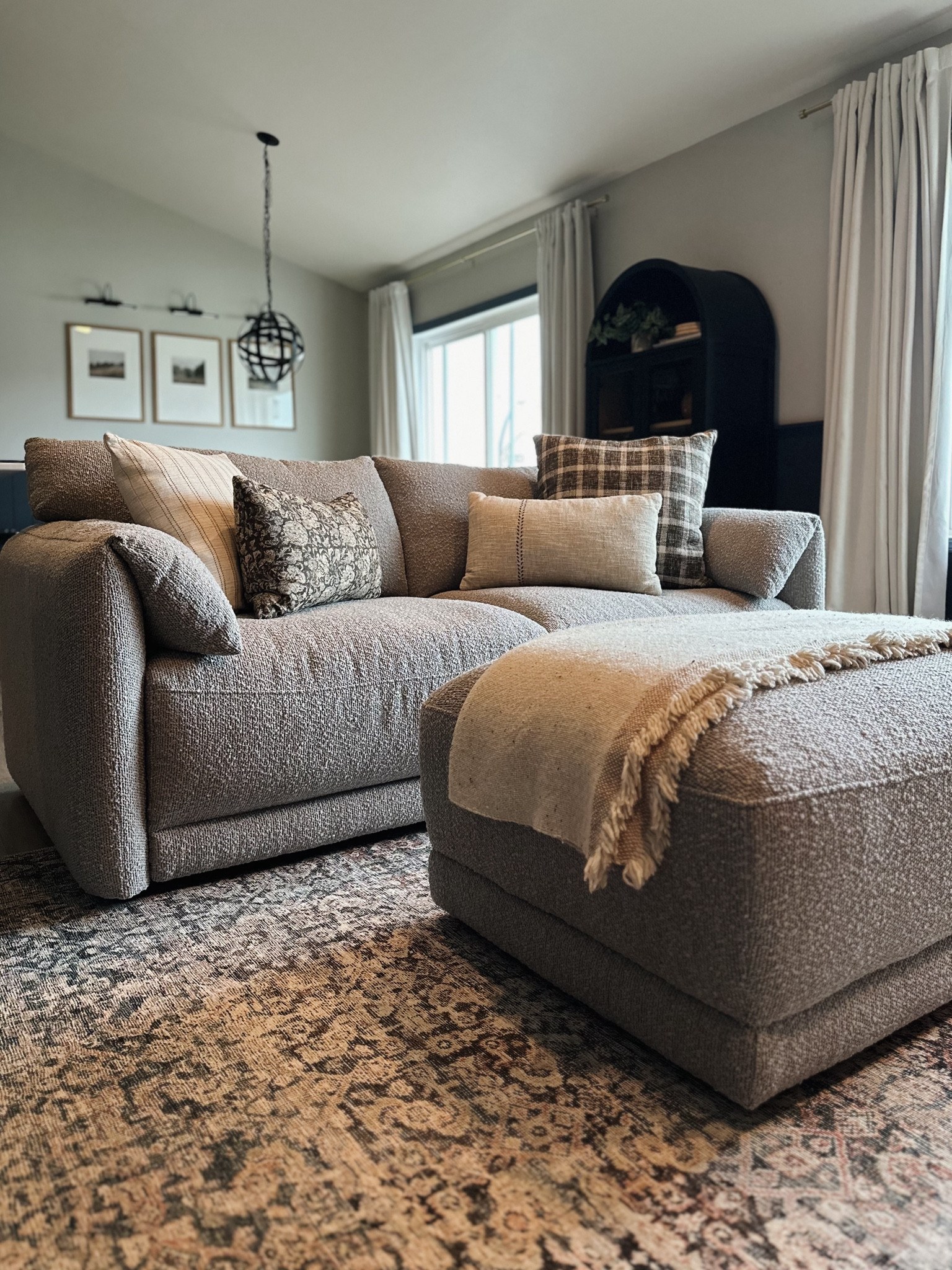 A close up of our new boucle sofa and ottoman from Chita! These new pillows from target are the perfect addition for fall😍

Boucle sofa, boucle ottoman, grey couch, grey sofa, plaid pillow, floral pillow, neutral pillows, striped pillows, Loloi rug, Georgie multi spice rug, amber Lewis, black arched cabinet, gallery wall, pottery barn dupe curtains, living room decor, throw pillows, studio McGee, hearth & hand 


#LTKHome #LTKStyleTip #LTKSeasonal