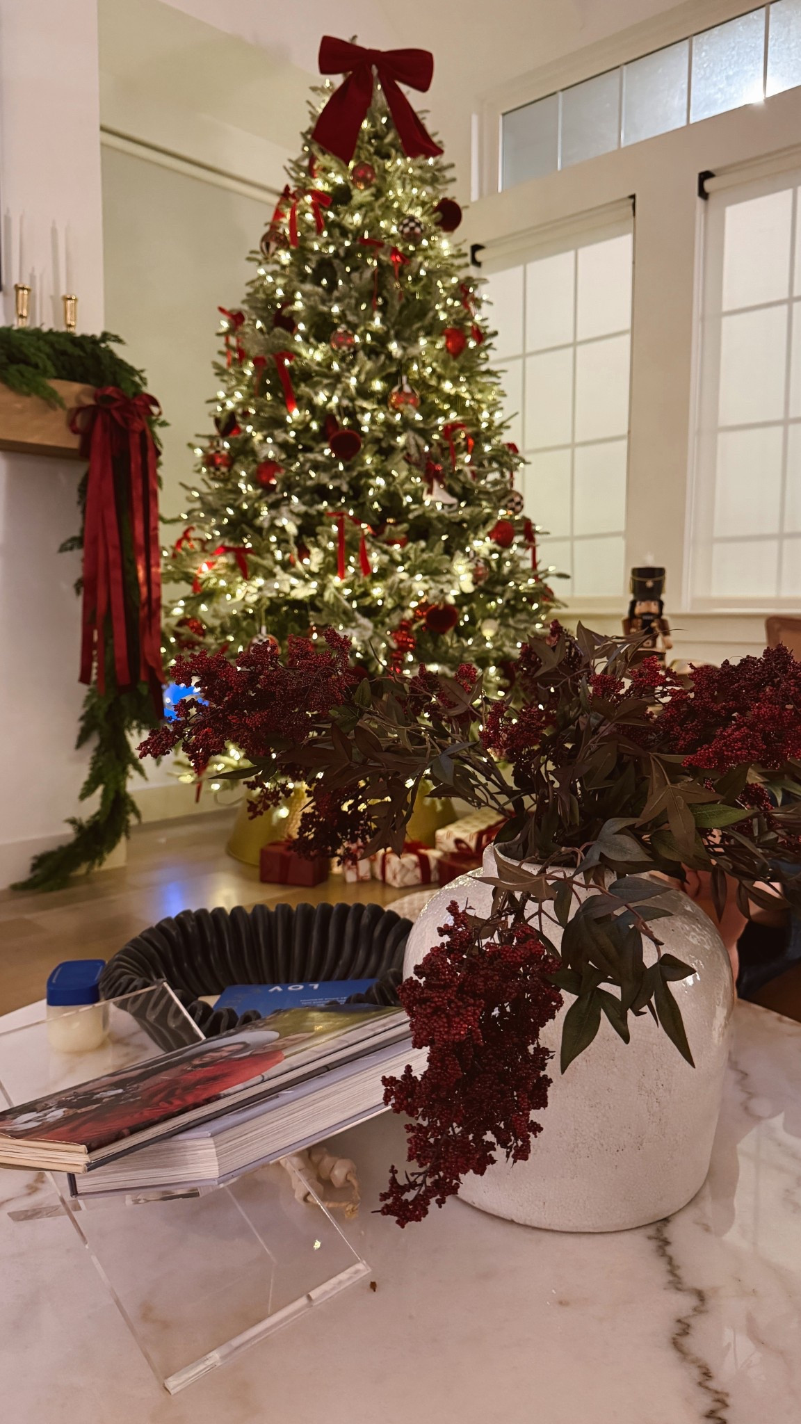 Christmas decor in our home. Love how these fall berries have transitioned to holiday decor in our home, which adds to their versatility!! Linking our frosted balsam hill tree, ribbon we use to create bows, red and burgundy ornaments, coffee table and more  

#LTKHoliday #LTKHome