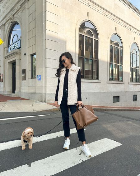 Kat Jamieson wears an easy everyday outfit for fall. Fall outfit, vest, Sherpa, denim, sneakers, tote bag, leather bag. 

#LTKSeasonal #LTKstyletip #LTKshoecrush