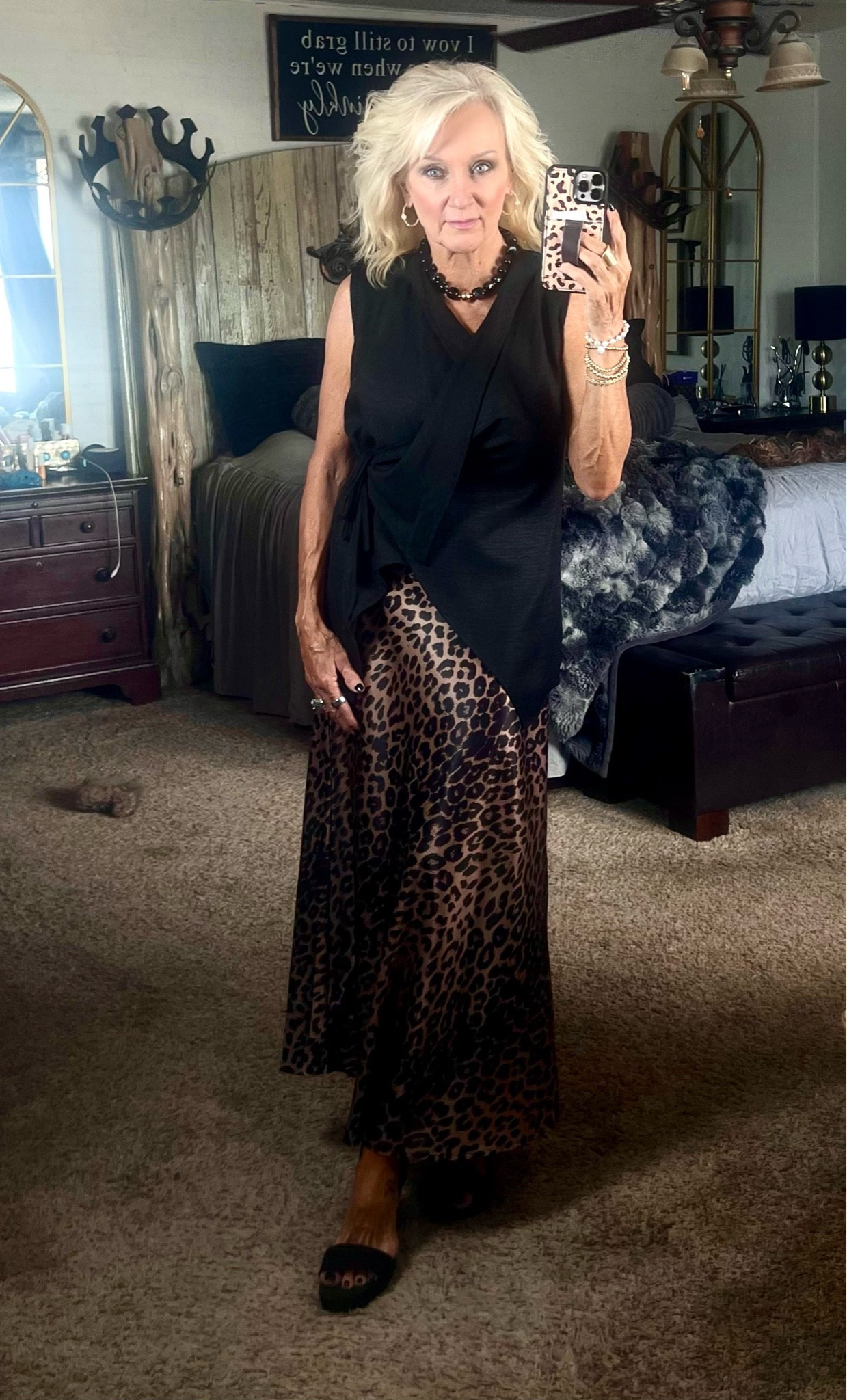 Love this flowy wrap top and satin cheetah skirt

#LTKootd #LTKmomlife #LTKOver40
