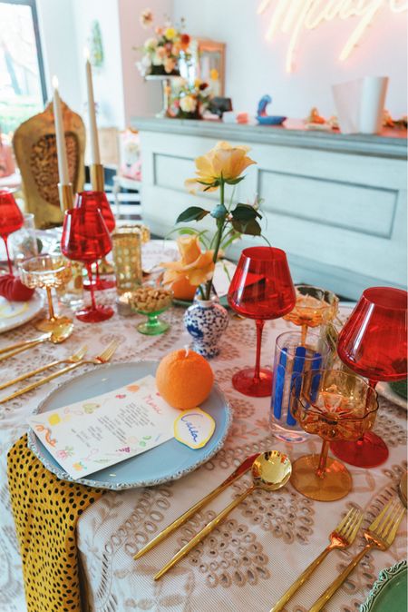 Eclectic Garden Party Tablescape Inspo with fruit shaped candles, colorful plates, and artful design

#LTKFestival #LTKSeasonal #LTKhome