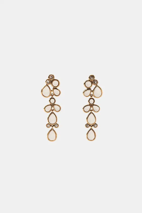 Model height: 177 cmMetal drop earrings featuring teardrop-shaped pieces with embedded crystals. ... | Zara DE