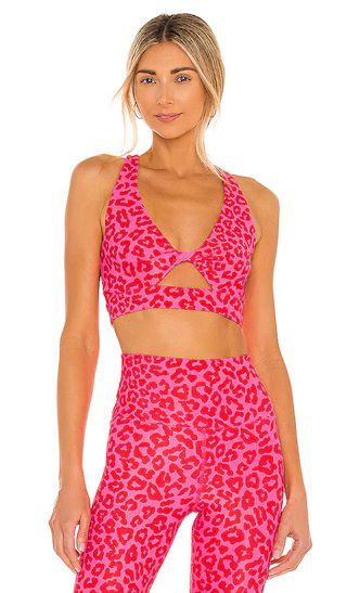 BEACH RIOT Twist Sports Bra in Pink. - size L (also in M, S, XS) | Revolve Clothing (Global)