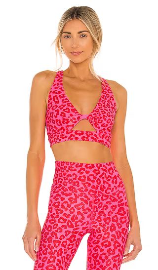 Twist Sports Bra in Famous High Risk Red Leopard | Revolve Clothing (Global)