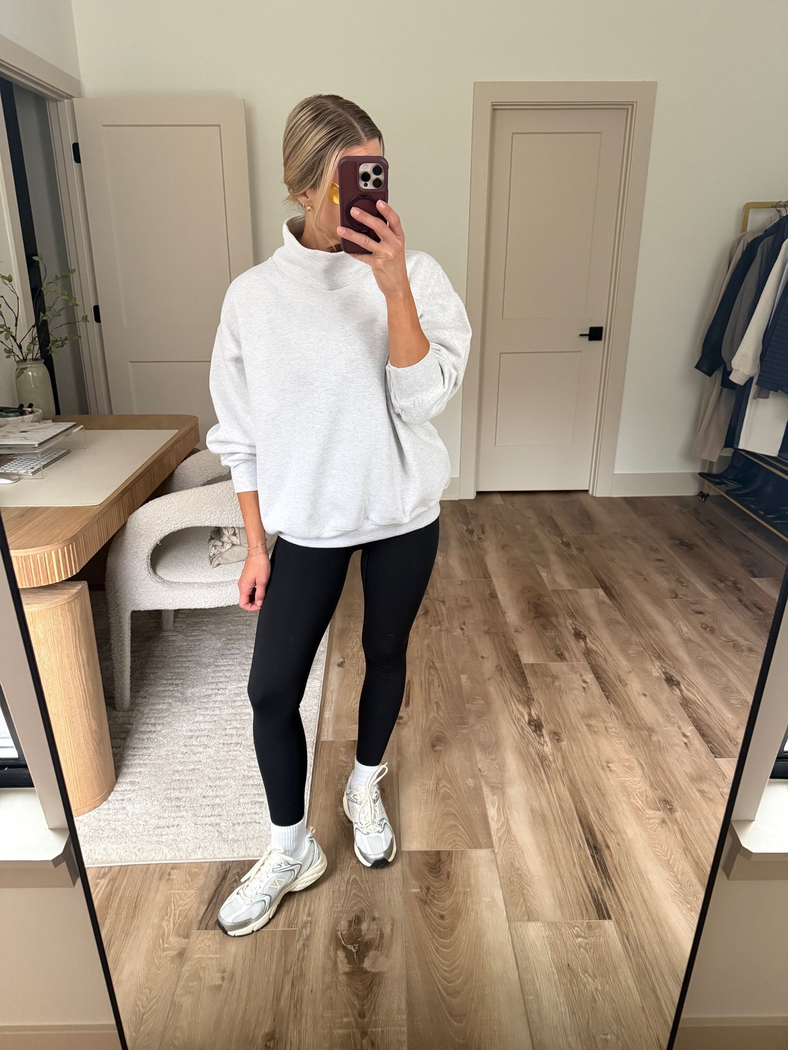 Wearing xs sweatshirt, small leggings, small cami, socks/sneakers tts