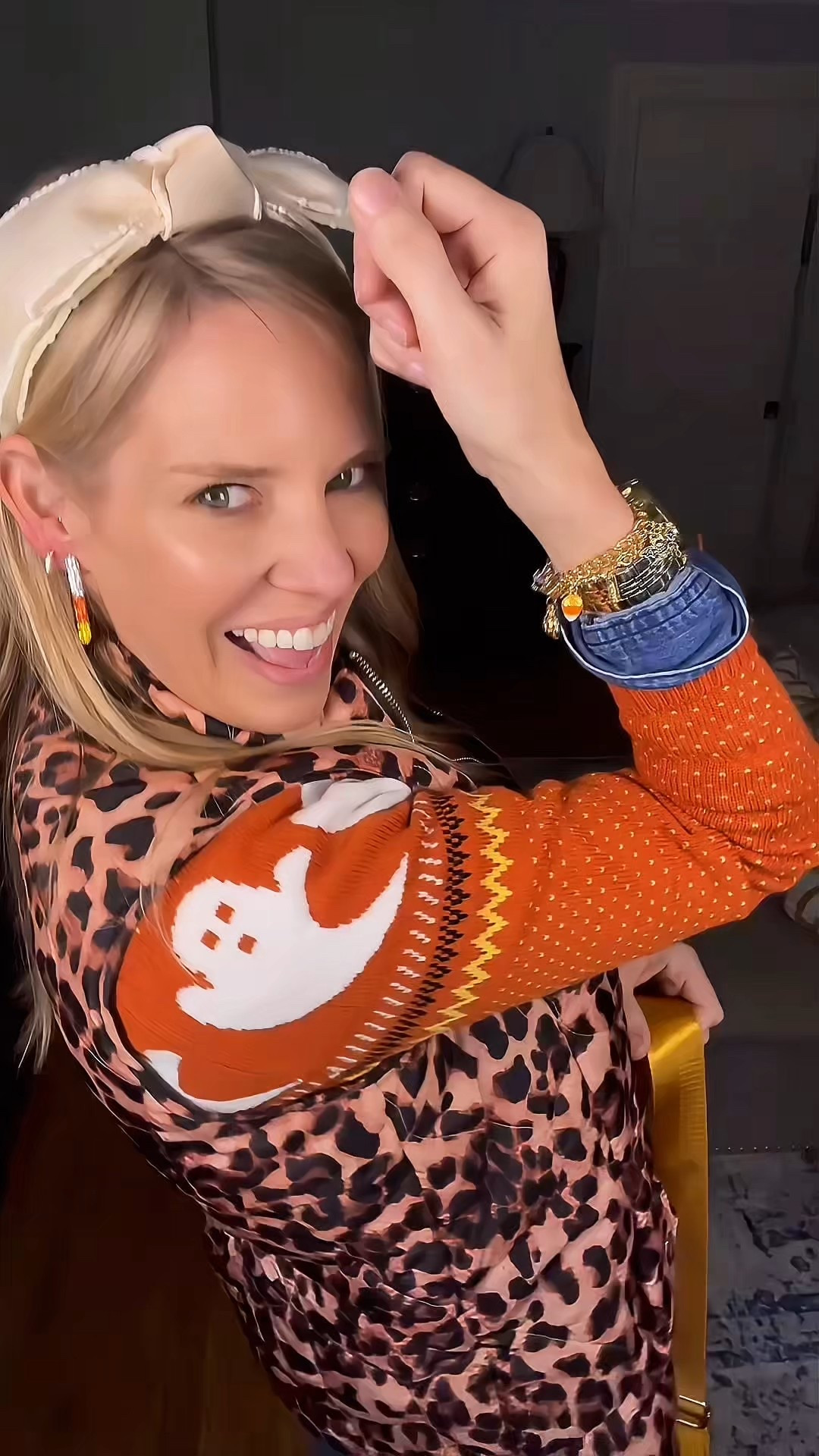 Fall layers but make them festive 🎃👻 I styled this cozy ghost print turtleneck sweater with a classic denim button-down shirt underneath for a preppy base, then added stretch corduroy leggings for comfort and warmth. The leopard quilted vest adds the perfect bold layer, while my ivory bow headband and candy corn earrings bring in those playful Halloween details. 🧡

Finished the look with a chic yellow crossbody bag + timeless accessories like my two-tone watch for a polished touch. This outfit works perfectly for pumpkin patches, school parties, or just cozy October days where you want to feel seasonal and stylish.

🛍️ Shop my full look below—Amazon, Talbots, Walmart, and BaubleBar finds all mixed together for a fun, affordable fall outfit!

✨ Keywords: Halloween sweater outfit, ghost print sweater, cozy fall layers, leopard vest outfit, corduroy leggings fall style, festive Halloween outfit for moms, candy corn earrings BaubleBar, affordable fall fashion finds, preppy layered fall outfit


#LTKFindsUnder50 #LTKFindsUnder100 #LTKItBag

#LTKFindsUnder50 #LTKOver40 #LTKFindsUnder100