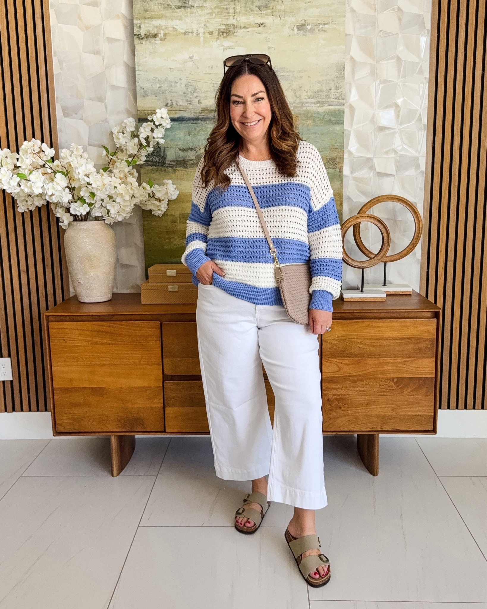 Comfy + polished is always a win 🤍 This lightweight striped sweater paired with cropped pants is the perfect mix of cozy and chic. Great for cooler mornings or casual days when you still want to look put together. Neutral accessories keep it fresh and easy!

Sizing: sweater, L // jeans size up, 14

#LTKOver40 #LTKMidsize #LTKSeasonal