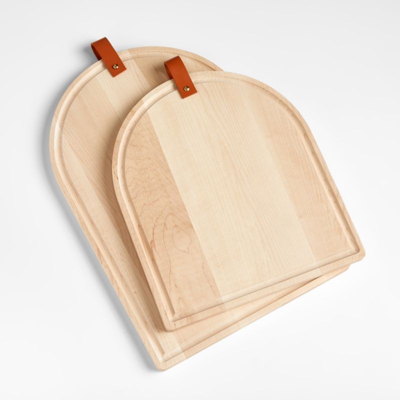 Tomos Maple Cutting Boards with Leather Straps | Crate & Barrel | Crate & Barrel