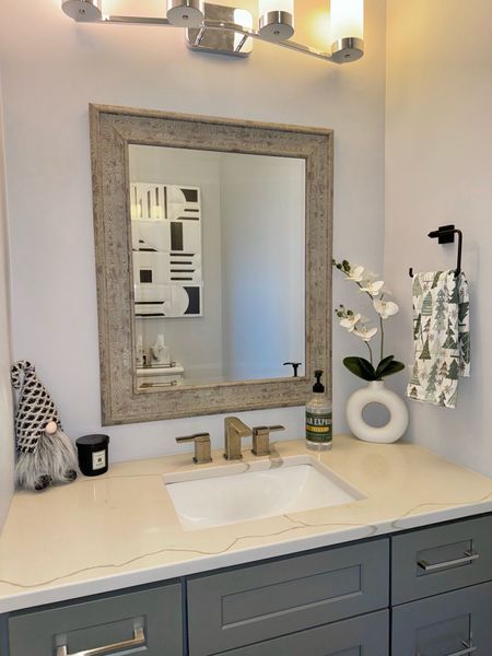 Simple Holiday Decor [ #HalfBath ] 

#bathroom
#greycabinets 
#marble
#Woodframemirror
#blackandwhitedecor

#LTKhome #LTKSeasonal #LTKHoliday