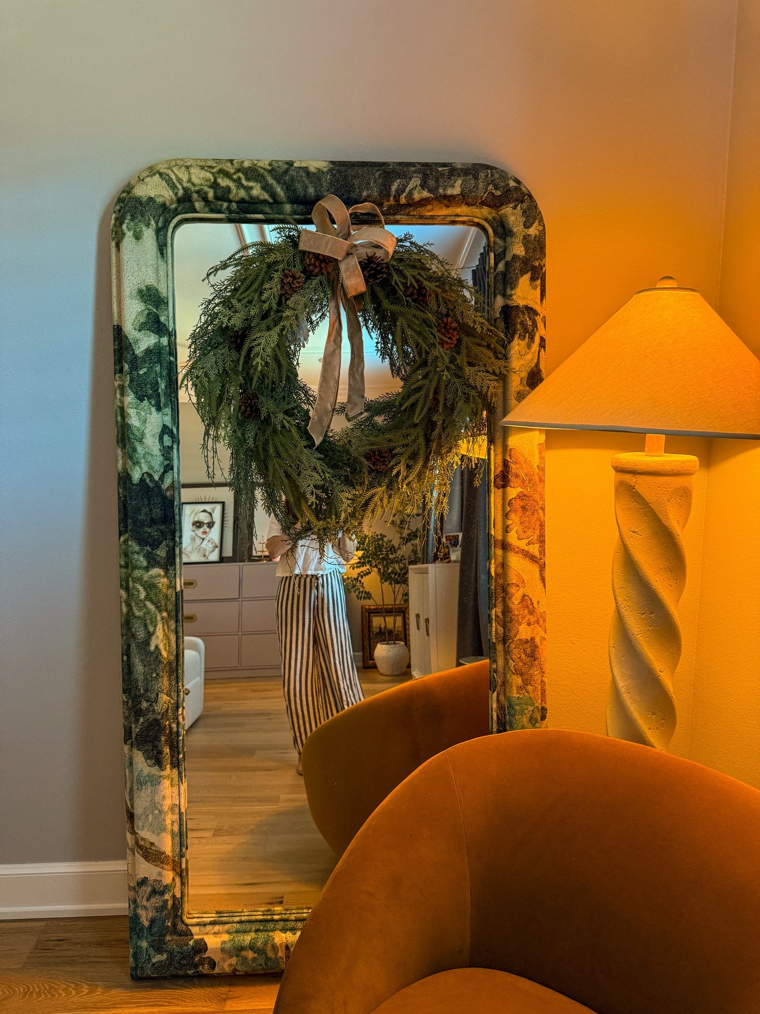 FAUX REAL 🌲Got a wreath before they’re gone! This one has a battery operated lights too! It’s great for front doors but I loveeee a wreath on a mirror to cozy up a bedroom or living space. I also leave it up all season long through the winter! 

Home inspo, holiday decorating, Christmas decor, home tips, floor mirror 

#LTKHoliday #LTKStyleTip #LTKHome