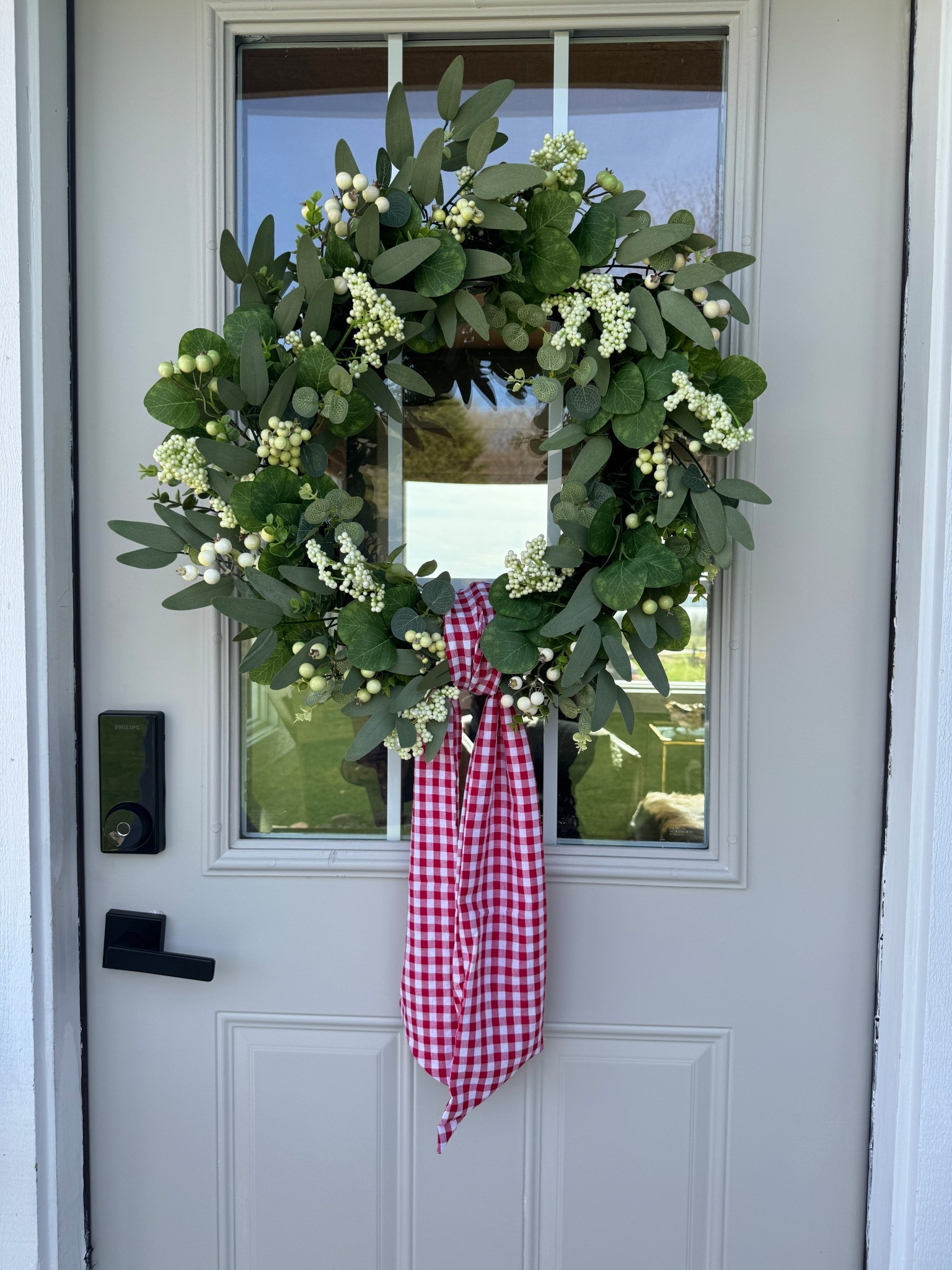 This wreath is sooooo good! An awesome all year around wreath. For Christmas I just add some red berries in and a Christmas sash. I went ahead and bought my Fourth of July sash to put on the wreath since we plan to entertain for Memorial Day & 4th of July. Totally elevated our door! Love it! 

#LTKHome