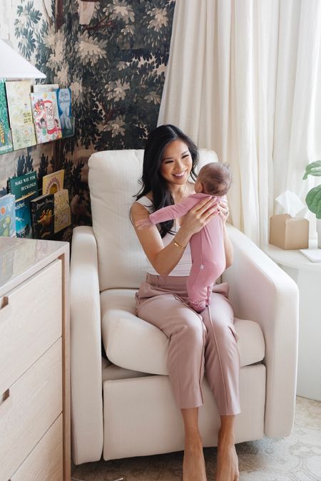 Nursery for a baby girl. This glider with performance fabric is my favorite because it rocks so smoothly, has a powered recliner and a USB port for charging. Also linking the dresser we use as a changing table, table lamp, side table, acrylic bookshelf and her ribbed footies. 

#LTKhome #LTKbaby #LTKfamily
