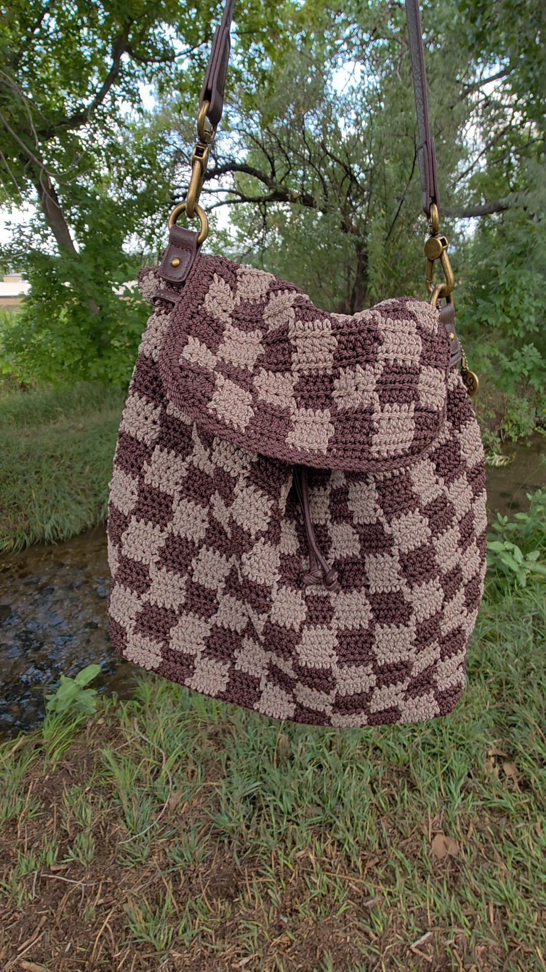 how cute is this crochet backpack? definitely my new day pack/adventure bag. comes in many other colors & patterns but love this one for the fall!

#LTKItBag #LTKU #LTKTravel