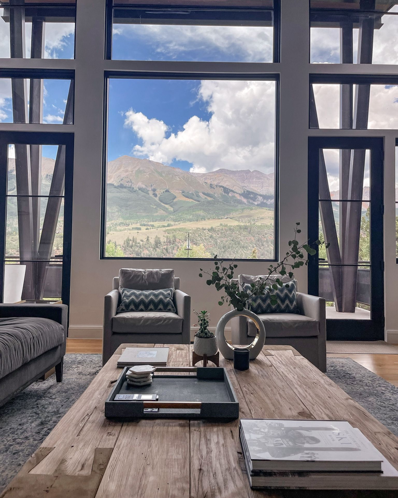 One of those areas that always seems to be tricky is your coffee table. While there needs to be room for the basics like the TV remote, um…a cup of coffee, and maybe a few pairs of bare feet (#boymom), you also want your coffee table to look elegant. Erin has beautiful coasters, a vase, candle, potted plant and books too. And notice how she spaces everything out to make full use of the tabletop’s surface? Her The Ultimate Ski Book and West: The American Cowboy coffee table books, family photo book, and gorgeous honeycomb coasters add that personal touch that let you know you’re in the Busbee house.

~Team Busbee

#LTKhome