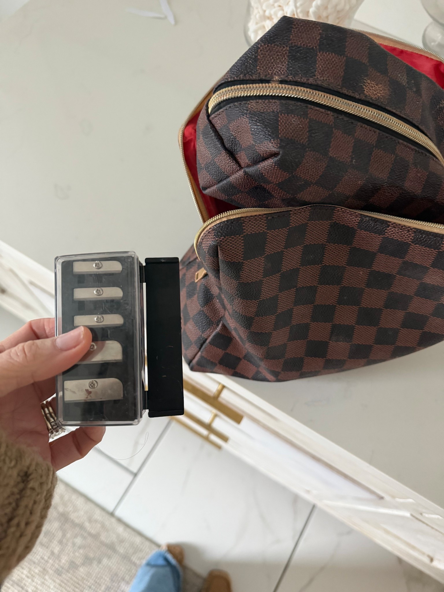 Makeup bag and universal makeup pencil sharpener 