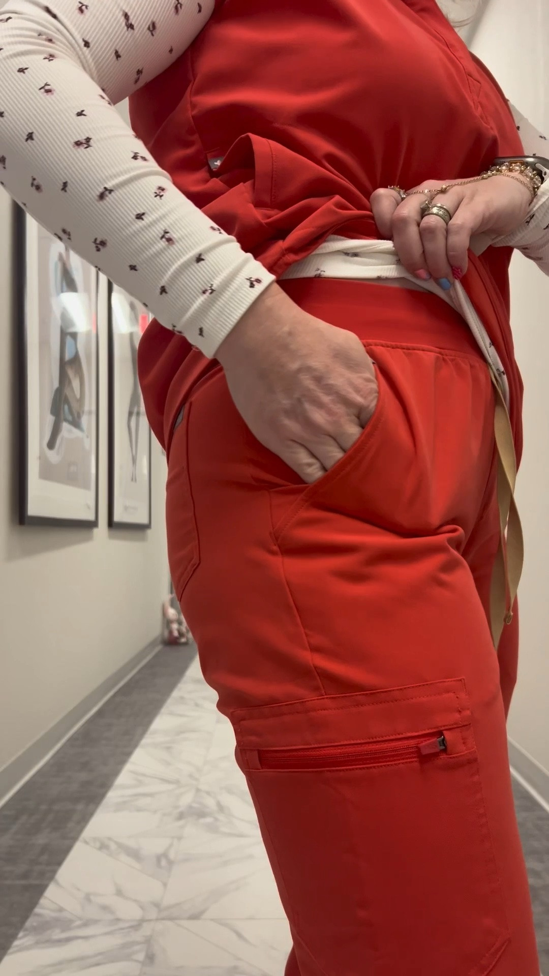 The details on these $29.99 Amazon scrubs are everything 🌺 Pockets that actually fit your hands, waistband that stays put all shift, and this $27.99 patterned underscrub stretches with every single move. I wore this for a full 12 hour shift and felt put together the whole time. XXS top XS bottoms, 5’2” 148lbs. Tap to shop both! 🌺