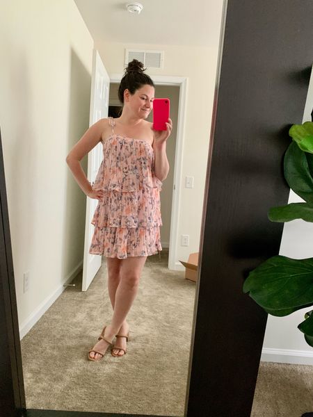 HONEST review of the Loella Floral Print Pleated Tiered One-Shoulder Minidress dress from Petal and Pup. 
OK, so initially, I had some trouble trying to figure out how to put on this dress. The straps are a little difficult to figure out but once you realize it’s a one shoulder dress it’s easy to tie. The pros are it’s a very, very comfortable dress almost feels like pajamas. There is a ton of room throughout the waist and bum. This dress is perfect. If you are newly pregnant, trying to hide a bump or just looking for extra comfort for your next event it hides all the imperfections. It’s a perfect price point under $100. The material and pattern is very high end I could see this as a perfect Mother’s Day brunch Dress, graduation dress, bridal shower, dress baby shower dress or a fancy dress for summer you don’t have to worry about the length. It fits perfectly above the knee and I am 5 foot I can wear low heels, sandals or high sandals run this before it sell out, it’s an excellent choice to have in your closet.

#LTKtravel #LTKstyletip #LTKfindsunder100