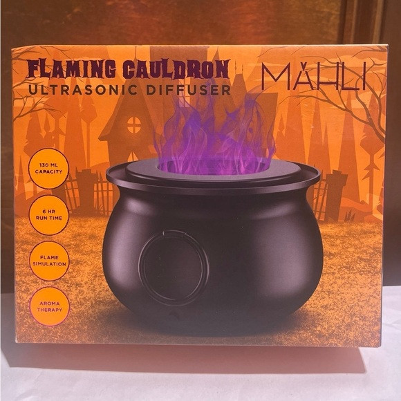 Mahli flamingo cauldron purple flame | Poshmark