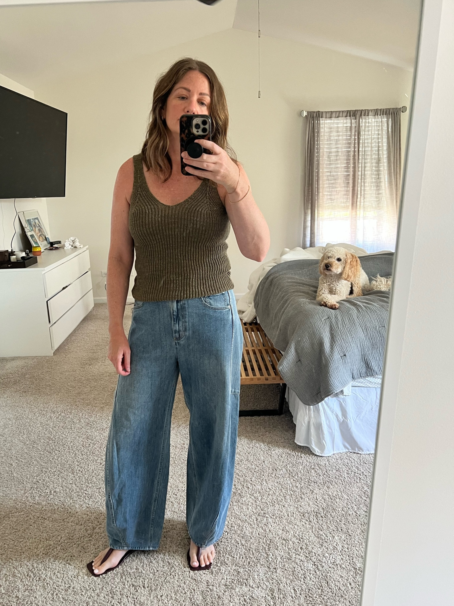 This time of year is so confusing to dress for, I want to wear my fall clothes but I’m sweating my butt off since it’s still upper 70’s and humid AF. So, a sweater tank it is. Also, long live baggy jeans, if you haven’t tried them yet you def should. My size popped up in an old version of these Sid jeans, on super sale but the new ones have snaps to adjust the length in back. 

#LTKStyleTip #LTKOver40 #LTKMidsize