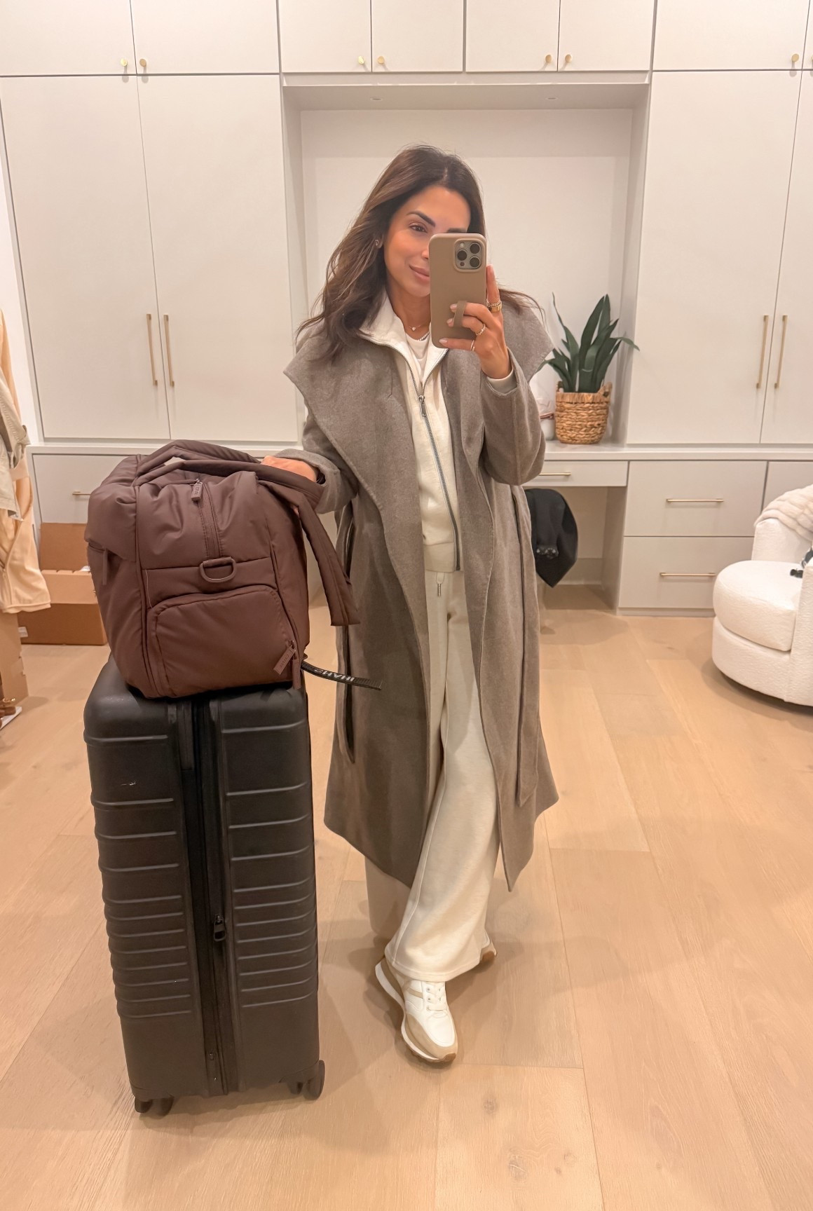 Today's travel look, wearing my usual set that's 20% off today! I have my true size XS and xs shirt length pants. I sized down to xxs in wrap coat but could've done my true size XS for extra room for layering! 

#LTKTravel #LTKSpringSale
