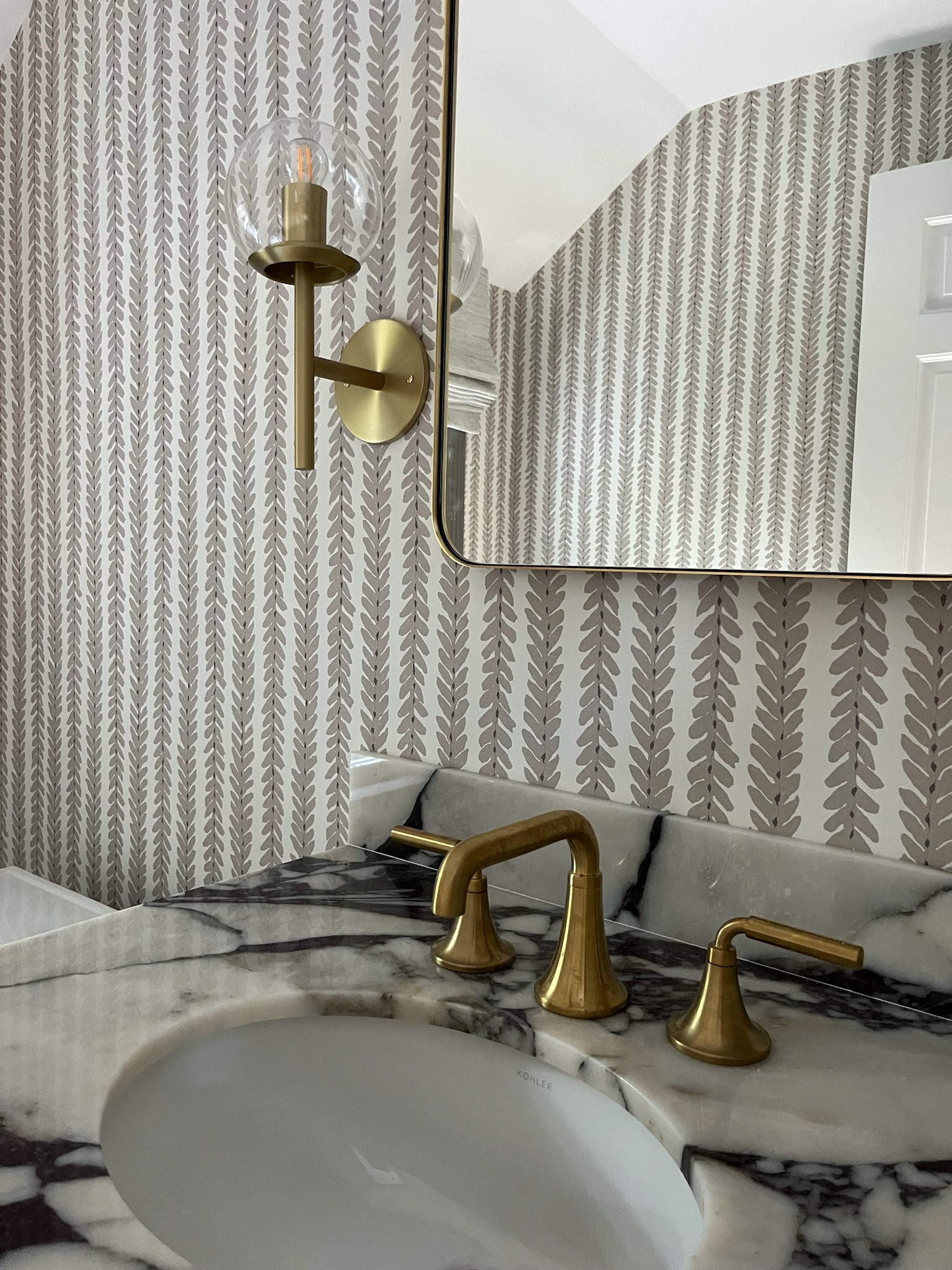 Upgrade your powder bathroom with these modern details from our Project No. 91, located in Boston, MA.

#ltkinteriordesign #ltkbathroom #ltkhome 

 