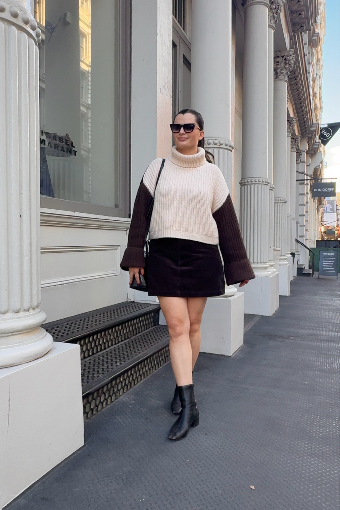 Cute and comfy fall ootd wearing a color block sweater and a brown corduroy mini skirt in SoHo NYC

#LTKFindsUnder100 #LTKSeasonal #LTKStyleTip