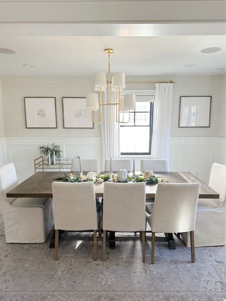 I’m  linking my Dining Room sources here! Snag my slipcovered dining chairs at TJ Maxx right now for $149! Our brass chandelier is such a classic piece and worth a splurge. It fits an 8 foot ceiling and a standard width dining table perfectly. Our Pottery Barn gallery frames are 25 x 25 and I have an 8 x 10 floral print in them. Also linking my grasscloth Wallpaper and washable Ruggable rug: 