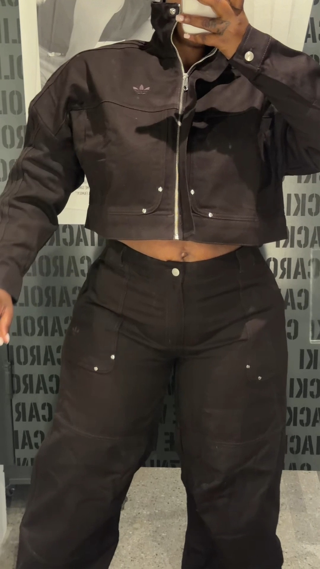 Wearing a size 18 in the skirt and the dress pants paired with a small top.