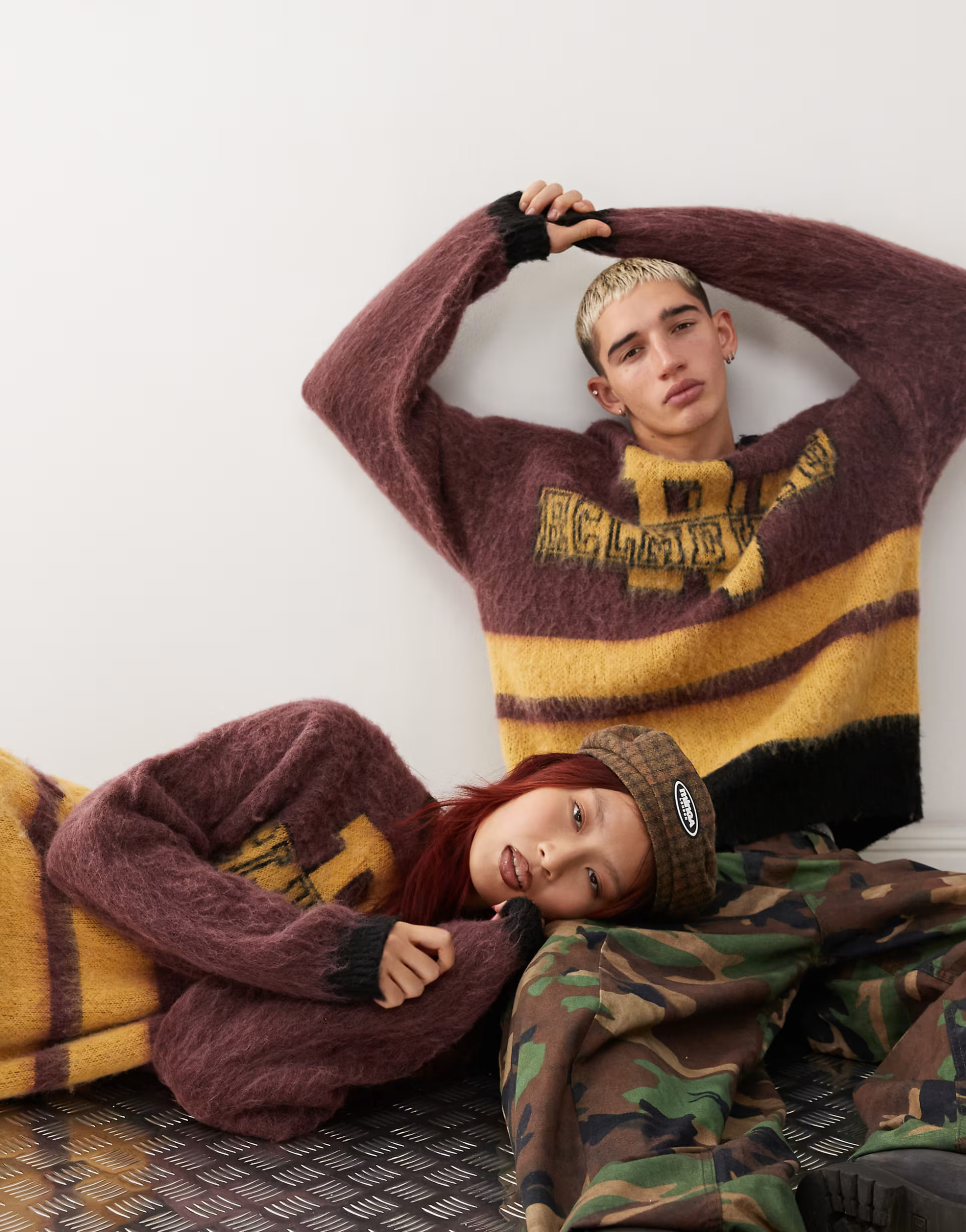 Reclaimed Vintage unisex varsity logo sweater in brown | ASOS (Global)