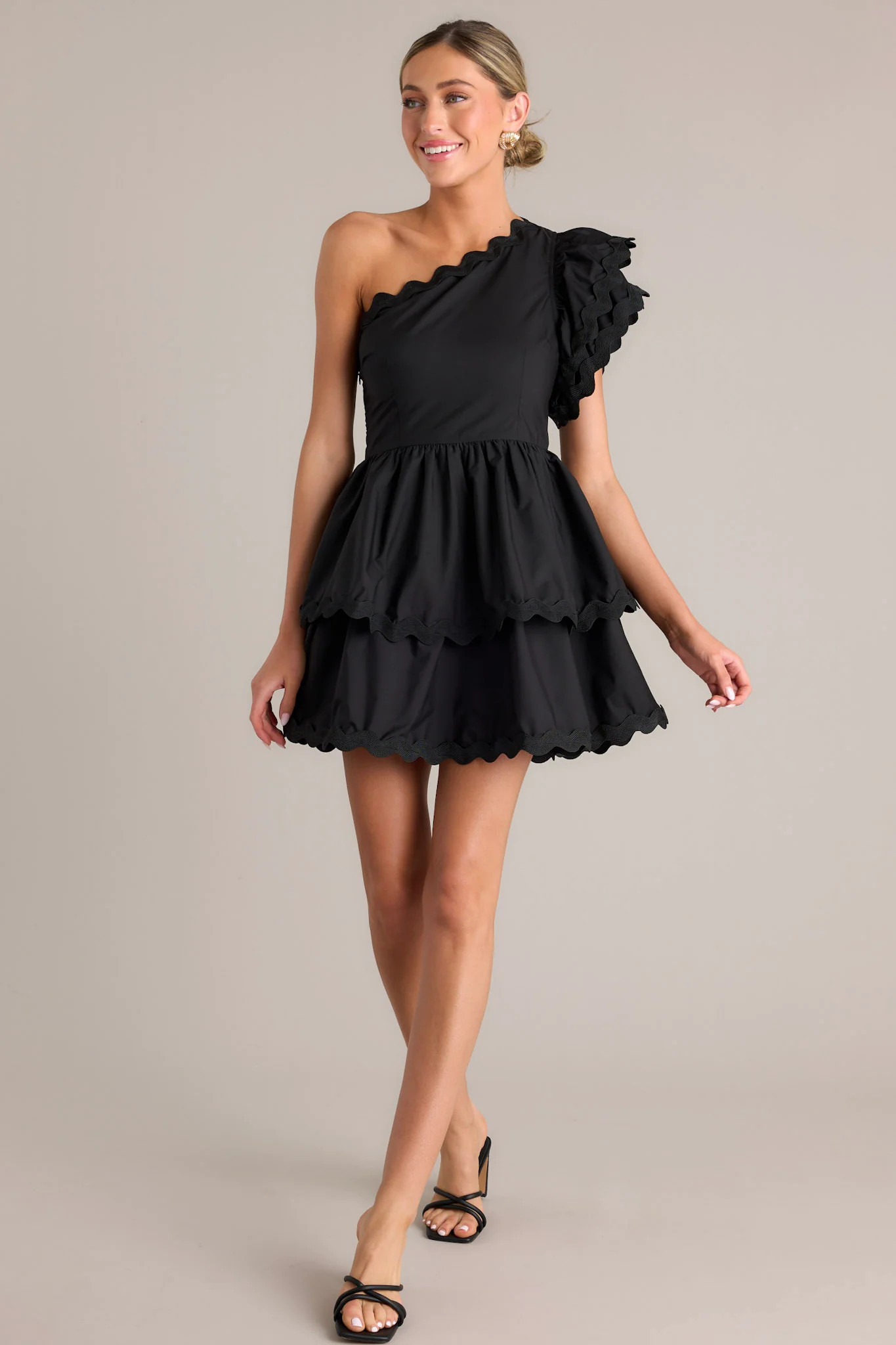 Flirty Flutter Black Scallop Tiered One Shoulder Romper | Red Dress