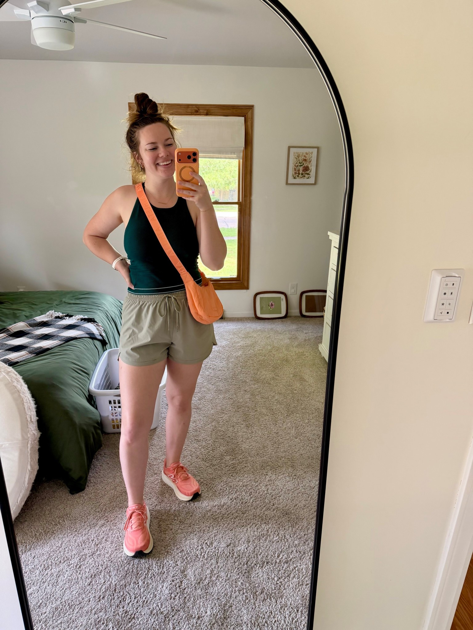 Colorful & cohesive! 🍂 I thought being an Autumn would mean I couldn’t wear bright colors anymore but I was wrong! I love my shoes (coral/apricot) & bum bag (apricot) - they definitely added a pop of color to my casual park play date outfit 🫶🏻 

My shorts are a perfect lizard gray match! Search for “ground fennel” 🐨🩶

#LTKootd #LTKSeasonal #LTKmomlife